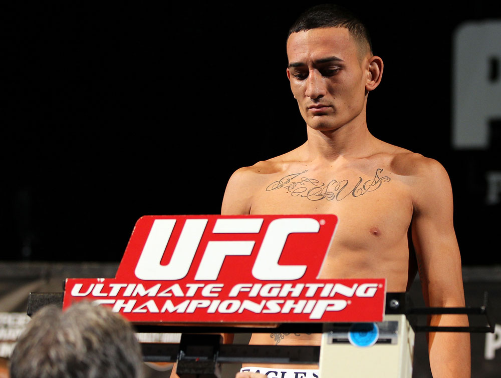 LAS VEGAS, NV - MAY 31:   Max Holloway makes weight during The Ultimate Fighter Live weigh in at the Palms Casino Resort on May 31, 2012 in Las Vegas, Nevada.  (Photo by Josh Hedges/Zuffa LLC/Zuffa LLC via Getty Images)  *** Local Caption *** Max Holloway