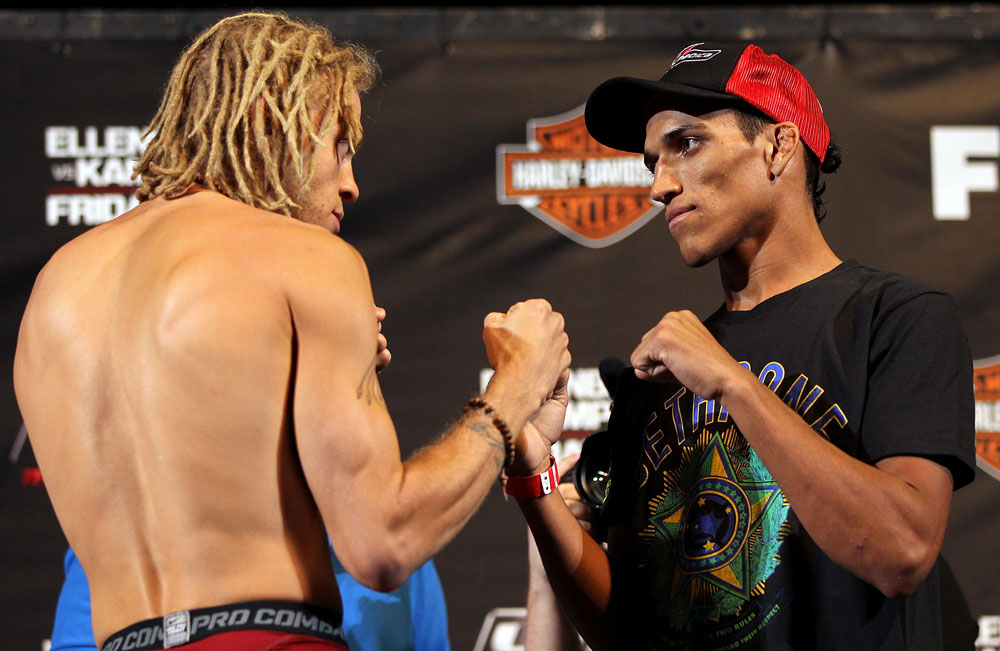 LAS VEGAS, NV - MAY 31:   (L-R) Opponents Jonathan Brookins and Charles Oliveira face off after making weight during The Ultimate Fighter Live weigh in at the Palms Casino Resort on May 31, 2012 in Las Vegas, Nevada.  (Photo by Josh Hedges/Zuffa LLC/Zuffa LLC via Getty Images)  *** Local Caption *** Jonathan Brookins; Charles Oliveira