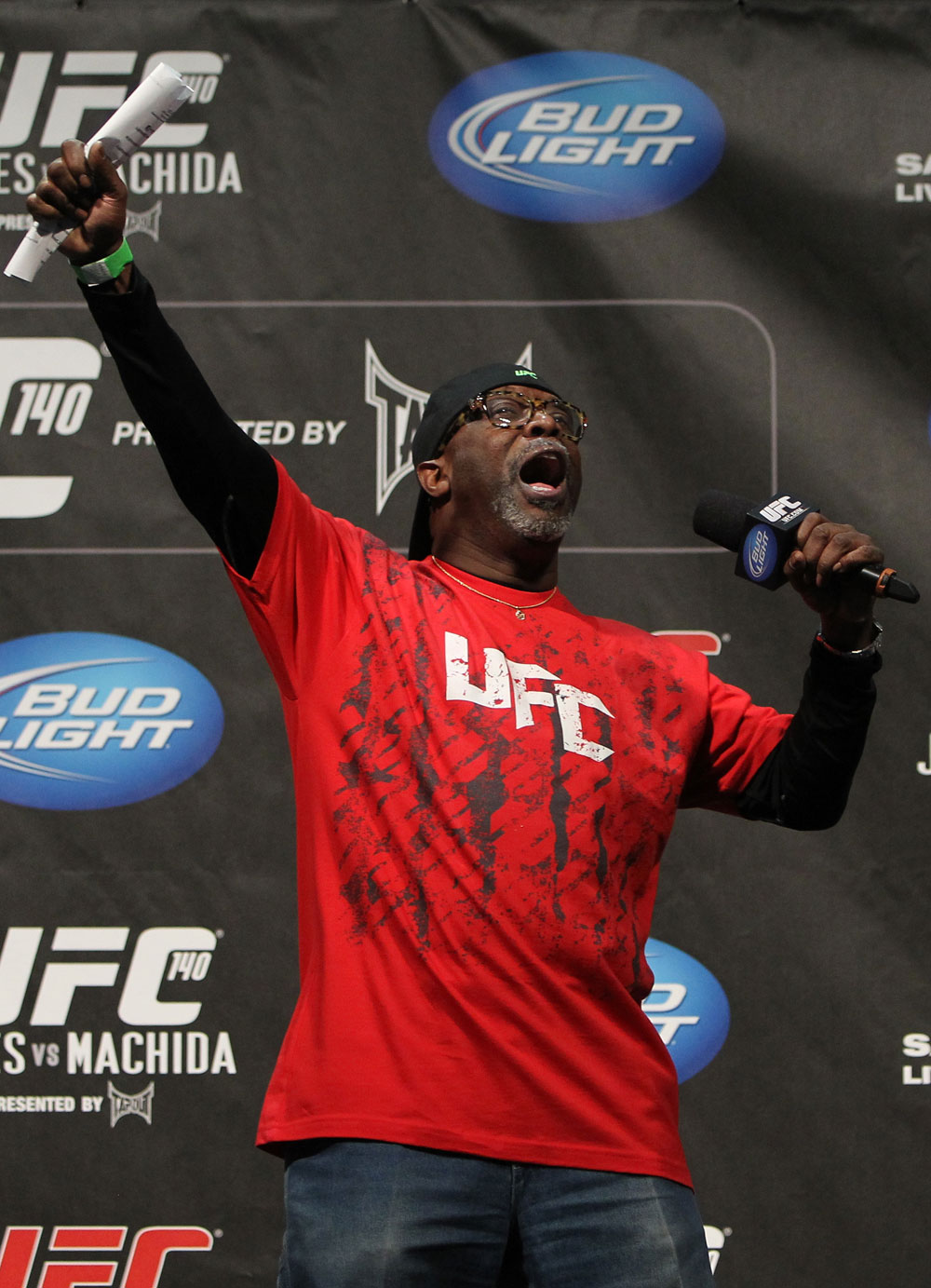 TORONTO, ON - DECEMBER 09:  UFC event coordinator Burt Watson fires up the crowd before the UFC 140 Official Weigh-in at the Air Canada Centre on December 9, 2011 in Toronto, Canada.  (Photo by Josh Hedges/Zuffa LLC/Zuffa LLC via Getty Images)