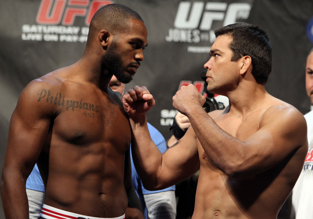TORONTO, ON - DECEMBER 09:  (L-R) UFC Light Heavyweight Champion Jon "Bones" Jones and challenger Lyoto Machida face off after weighing in during the UFC 140 Official Weigh-in at the Air Canada Centre on December 9, 2011 in Toronto, Canada.  (Photo by Josh Hedges/Zuffa LLC/Zuffa LLC via Getty Images)