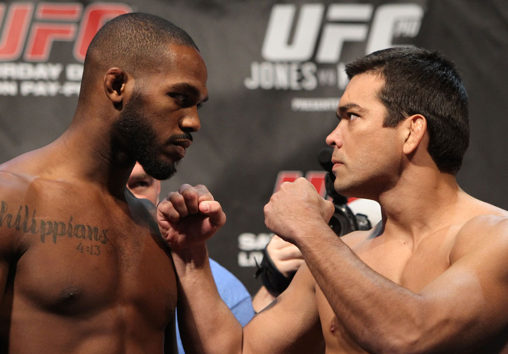 TORONTO, ON - DECEMBER 09:  (L-R) UFC Light Heavyweight Champion Jon "Bones" Jones and challenger Lyoto Machida face off after weighing in during the UFC 140 Official Weigh-in at the Air Canada Centre on December 9, 2011 in Toronto, Canada.  (Photo by Josh Hedges/Zuffa LLC/Zuffa LLC via Getty Images)