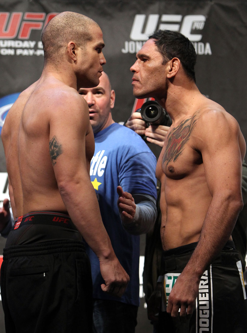 TORONTO, ON - DECEMBER 09:  (L-R) Light Heavyweight opponents Tito Ortiz and Antonio Rogerio "Minotoro" Nogueira face off after weighing in during the UFC 140 Official Weigh-in at the Air Canada Centre on December 9, 2011 in Toronto, Canada.  (Photo by Josh Hedges/Zuffa LLC/Zuffa LLC via Getty Images)