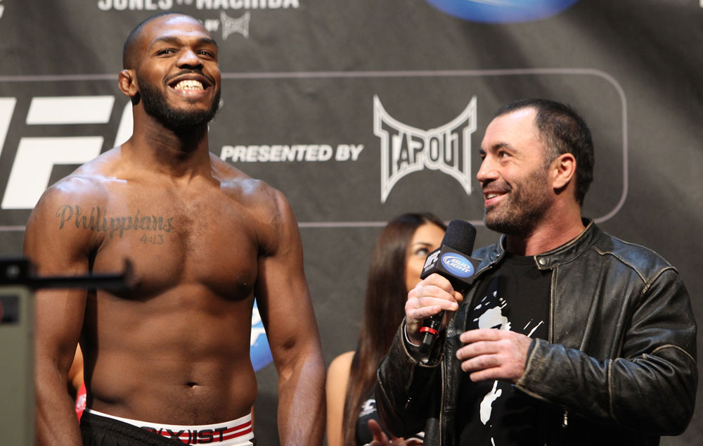 TORONTO, ON - DECEMBER 09:  (L-R) UFC Light Heavyweight Champion Jon "Bones" Jones is interviewed by Joe Rogan after the UFC 140 Official Weigh-in at the Air Canada Centre on December 9, 2011 in Toronto, Canada.  (Photo by Josh Hedges/Zuffa LLC/Zuffa LLC via Getty Images)