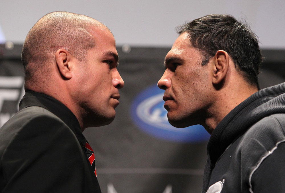 TORONTO, ON - DECEMBER 08: (L-R) Light Heavyweight opponents Tito Ortiz and Antonio Rogerio "Minotoro" Nogueira face off at the final UFC 140 pre-fight press conference at Bell Tiff Lightbox Cinema1 on December 8, 2011 in Toronto, Canada. (Photo by Josh Hedges/Zuffa LLC/Zuffa LLC via Getty Images)