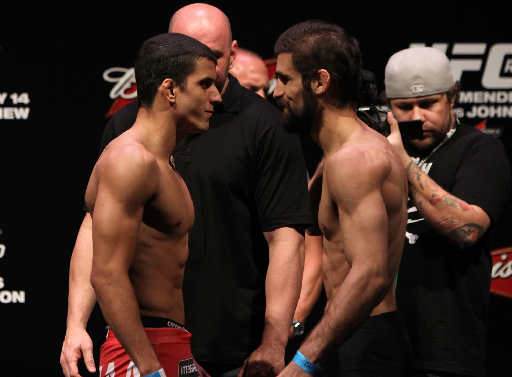 RIO DE JANEIRO, BRAZIL - JANUARY 13:  (L-R) Opponents Felipe Arantes and Antonio Carvalho face off after weighing in during the UFC 142 Weigh In at HSBC Arena on January 13, 2012 in Rio de Janeiro, Brazil.  (Photo by Josh Hedges/Zuffa LLC/Zuffa LLC via Getty Images)