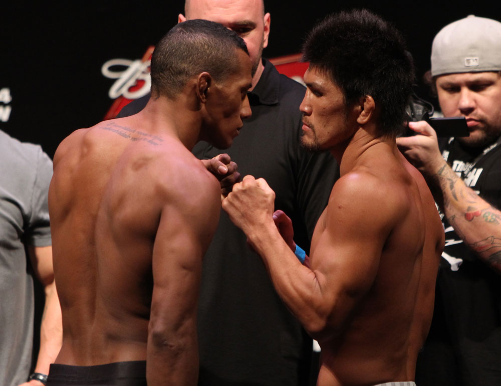 RIO DE JANEIRO, BRAZIL - JANUARY 13:  (L-R) Opponents Yuri Alcantara and Michihiro Omigawa face off after weighing in during the UFC 142 Weigh In at HSBC Arena on January 13, 2012 in Rio de Janeiro, Brazil.  (Photo by Josh Hedges/Zuffa LLC/Zuffa LLC via Getty Images)