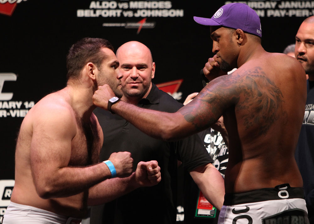 RIO DE JANEIRO, BRAZIL - JANUARY 13: (L-R) Opponents Gabriel Gonzaga and Ednaldo Oliveira face off after weighing in during the UFC 142 Weigh In at HSBC Arena on January 13, 2012 in Rio de Janeiro, Brazil. (Photo by Josh Hedges/Zuffa LLC/Zuffa LLC via Getty Images)