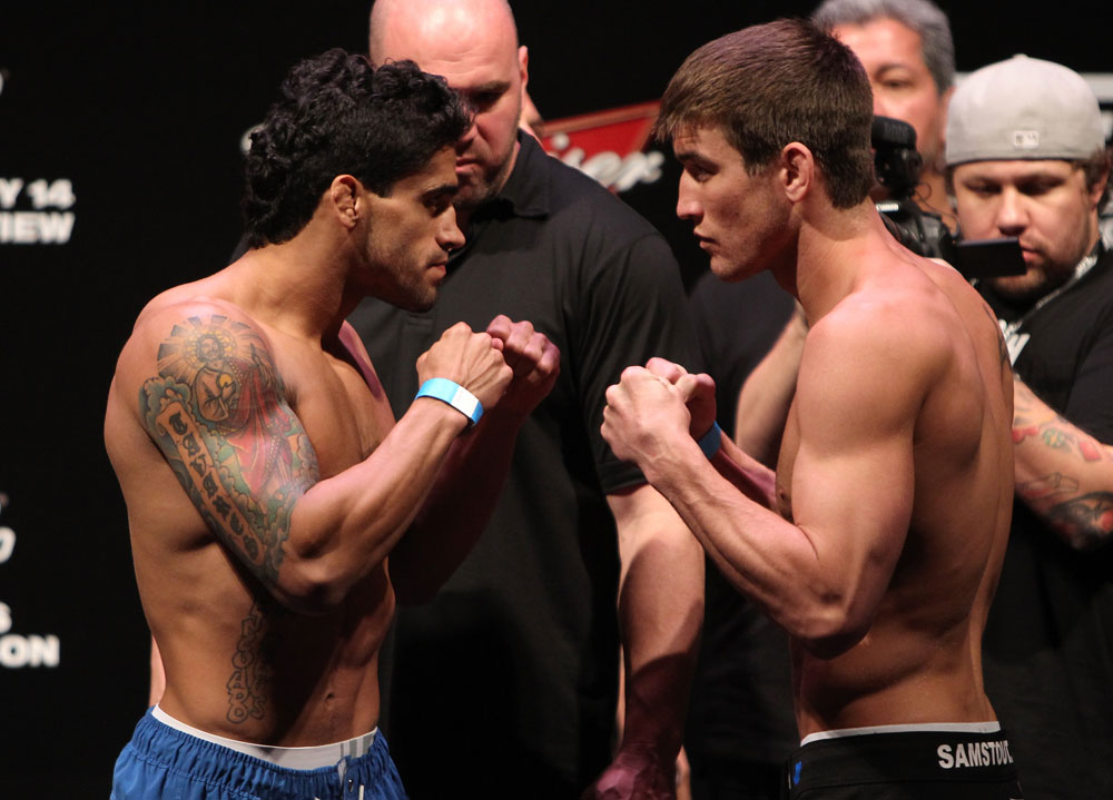 RIO DE JANEIRO, BRAZIL - JANUARY 13:  (L-R) Opponents Thiago Tavares and Sam Stout face off after weighing in during the UFC 142 Weigh In at HSBC Arena on January 13, 2012 in Rio de Janeiro, Brazil.  (Photo by Josh Hedges/Zuffa LLC/Zuffa LLC via Getty Images)
