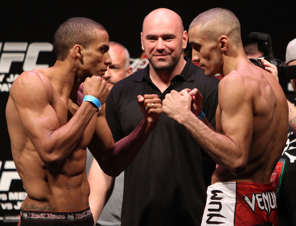 RIO DE JANEIRO, BRAZIL - JANUARY 13:  (L-R) Opponents Edson Barboza and Terry Etim face off after weighing in during the UFC 142 Weigh In at HSBC Arena on January 13, 2012 in Rio de Janeiro, Brazil.  (Photo by Josh Hedges/Zuffa LLC/Zuffa LLC via Getty Images)