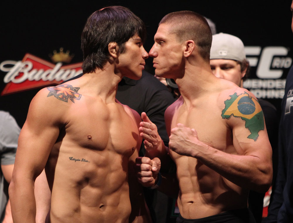 RIO DE JANEIRO, BRAZIL - JANUARY 13:  (L-R) Opponents Erick Silva and Carlo Prater face off after weighing in during the UFC 142 Weigh In at HSBC Arena on January 13, 2012 in Rio de Janeiro, Brazil.  (Photo by Josh Hedges/Zuffa LLC/Zuffa LLC via Getty Images)