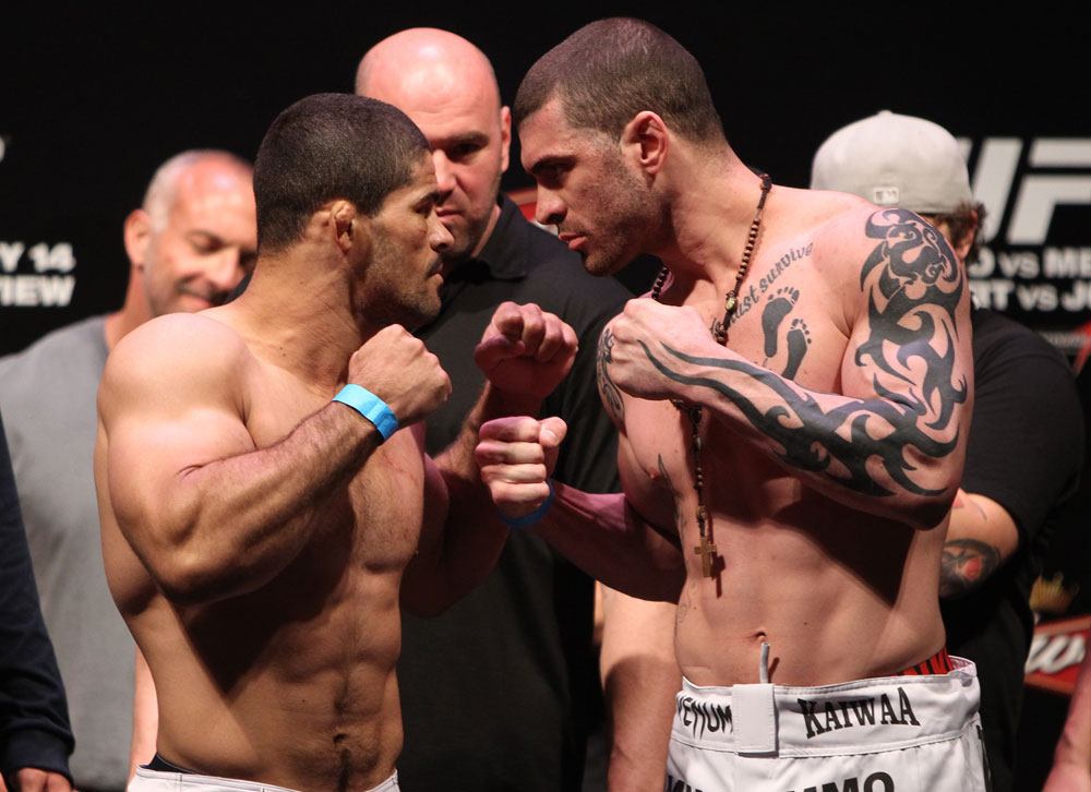 RIO DE JANEIRO, BRAZIL - JANUARY 13: (L-R) Rousimar Palhares and Mike Massenzio face off after weighing in during the UFC 142 Weigh In at HSBC Arena on January 13, 2012 in Rio de Janeiro, Brazil. (Photo by Josh Hedges/Zuffa LLC/Zuffa LLC via Getty Images)