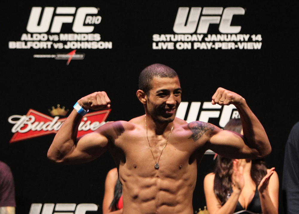 RIO DE JANEIRO, BRAZIL - JANUARY 13: UFC Featherweight Champion Jose Aldo weighs in during the UFC 142 Weigh In at HSBC Arena on January 13, 2012 in Rio de Janeiro, Brazil. (Photo by Josh Hedges/Zuffa LLC/Zuffa LLC via Getty Images)