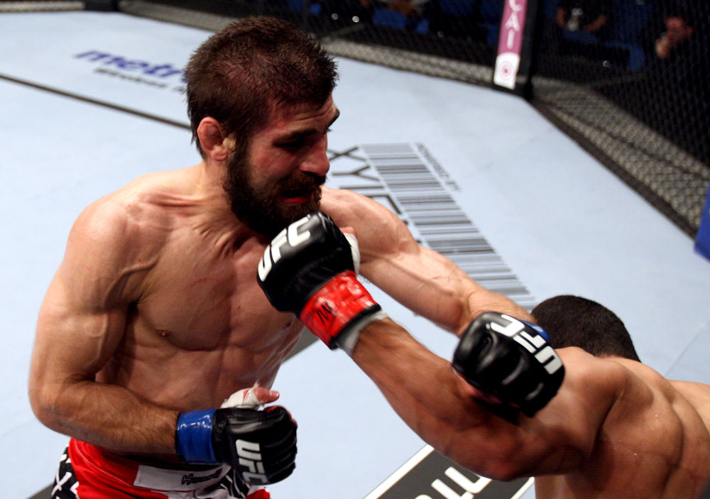 RIO DE JANEIRO, BRAZIL - JANUARY 14: Felipe Arantes (R) lands a punch as Antonio Carvalho (L) misses in a featherweight bout during UFC 142 at HSBC Arena on January 14, 2012 in Rio de Janeiro, Brazil. (Photo by Josh Hedges/Zuffa LLC/Zuffa LLC via Getty Images)
