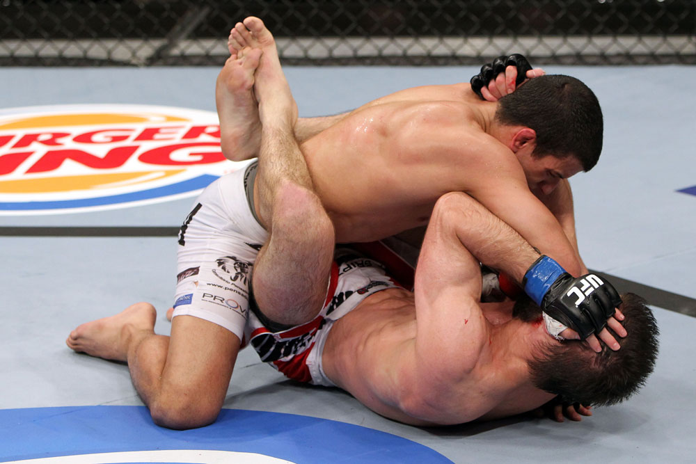 RIO DE JANEIRO, BRAZIL - JANUARY 14: Felipe Arantes (Top) punches Antonio Carvalho (Bottom) in a featherweight bout during UFC 142 at HSBC Arena on January 14, 2012 in Rio de Janeiro, Brazil. (Photo by Josh Hedges/Zuffa LLC/Zuffa LLC via Getty Images)