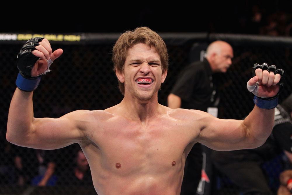 RIO DE JANEIRO, BRAZIL - JANUARY 14: Mike Pyle celebrates after defeating Ricardo Funch in a welterweight bout during UFC 142 at HSBC Arena on January 14, 2012 in Rio de Janeiro, Brazil. (Photo by Josh Hedges/Zuffa LLC/Zuffa LLC via Getty Images)