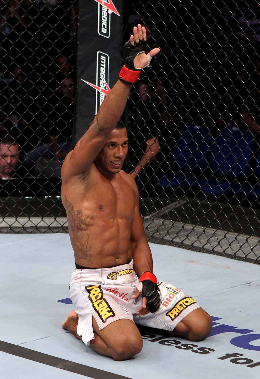 RIO DE JANEIRO, BRAZIL - JANUARY 14: Yuri Alcantara celebrates after defeating Michihiro Omigawa in a featherweight bout during UFC 142 at HSBC Arena on January 14, 2012 in Rio de Janeiro, Brazil. (Photo by Josh Hedges/Zuffa LLC/Zuffa LLC via Getty Images)