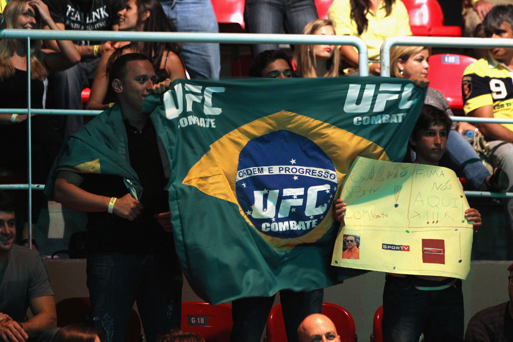 RIO DE JANEIRO, BRAZIL - JANUARY 14: Fans cheer prior to the Jose Aldo versus Chad Mendes featherweight bout during UFC 142 at HSBC Arena on January 14, 2012 in Rio de Janeiro, Brazil. (Photo by Josh Hedges/Zuffa LLC/Zuffa LLC via Getty Images)