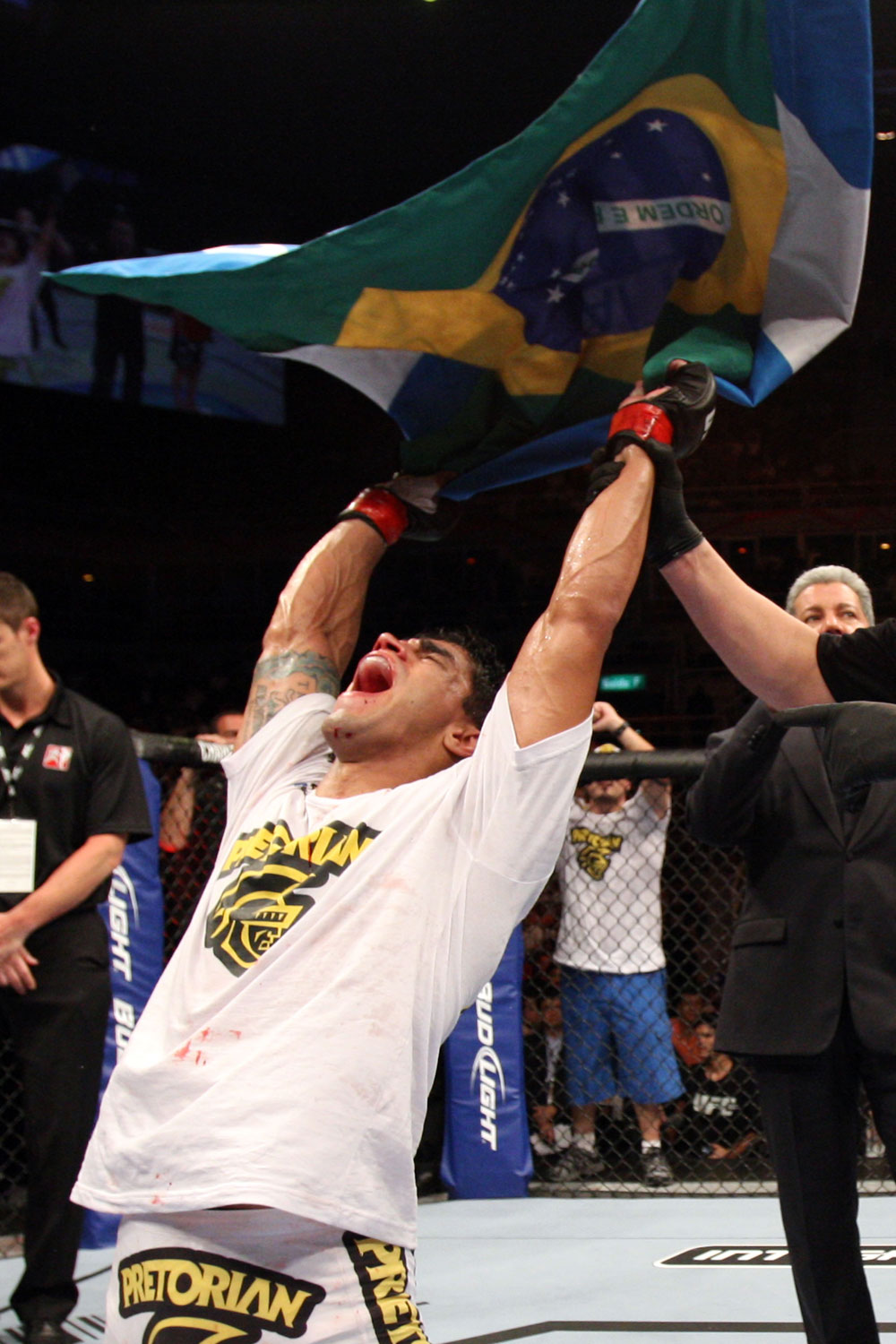 RIO DE JANEIRO, BRAZIL - JANUARY 14: Thiago Tavares celebrates after defeating Sam Stout in a lightweight bout during UFC 142 at HSBC Arena on January 14, 2012 in Rio de Janeiro, Brazil. (Photo by Josh Hedges/Zuffa LLC/Zuffa LLC via Getty Images)
