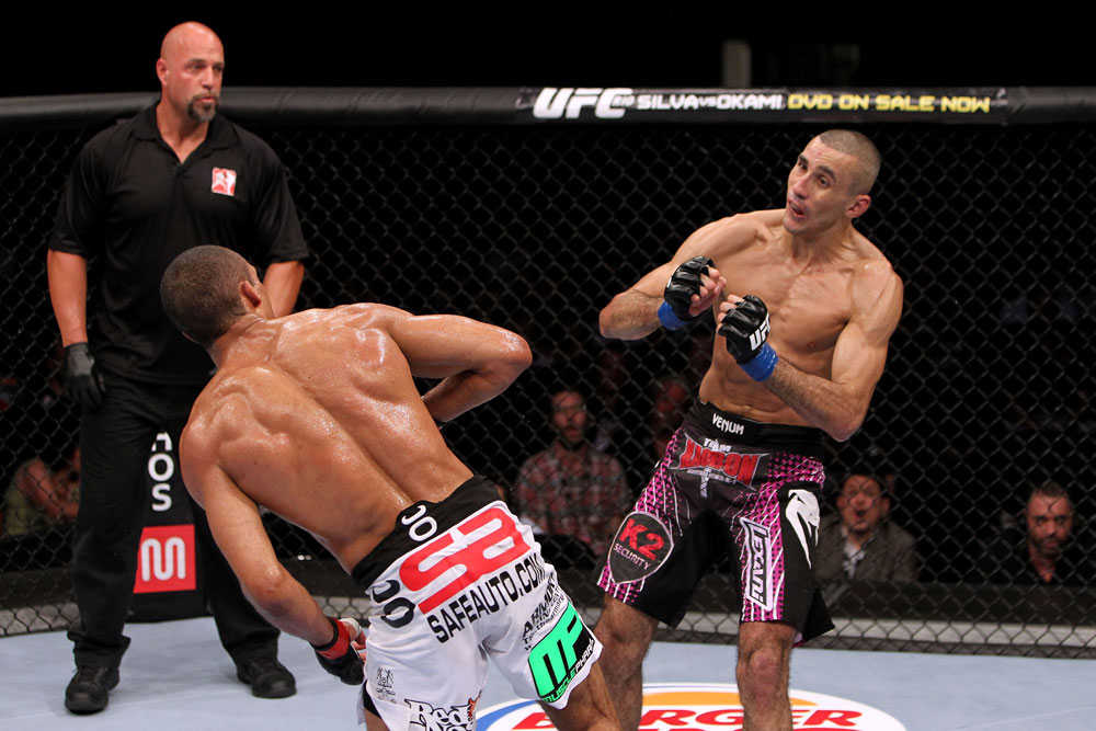RIO DE JANEIRO, BRAZIL - JANUARY 14: Edson Barboza (L) knocks out Terry Etim (R) with a spinning back kick in a lightweight bout during UFC 142 at HSBC Arena on January 14, 2012 in Rio de Janeiro, Brazil. (Photo by Josh Hedges/Zuffa LLC/Zuffa LLC via Getty Images)