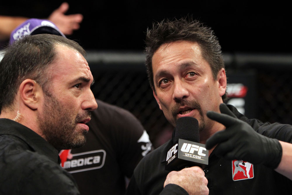 RIO DE JANEIRO, BRAZIL - JANUARY 14: Referee Mario Yamasaki (R) explains his decision for calling the welterweight bout between Erick Silva and Carlo Prater during UFC 142 at HSBC Arena on January 14, 2012 in Rio de Janeiro, Brazil. (Photo by Josh Hedges/Zuffa LLC/Zuffa LLC via Getty Images)