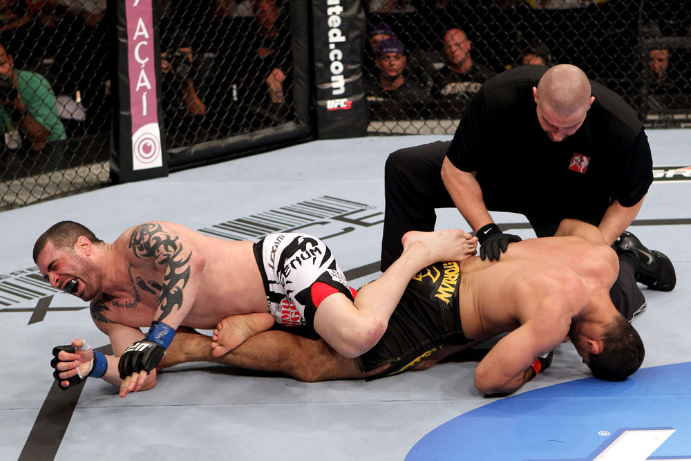 RIO DE JANEIRO, BRAZIL - JANUARY 14: Rousimar Palhares submits Mike Massenzio in a middleweight bout during UFC 142 at HSBC Arena on January 14, 2012 in Rio de Janeiro, Brazil. (Photo by Josh Hedges/Zuffa LLC/Zuffa LLC via Getty Images)