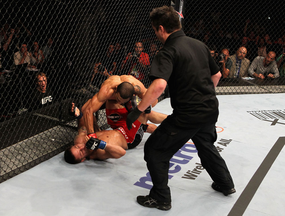 RIO DE JANEIRO, BRAZIL - JANUARY 14: Jose Aldo punches Chad Mendes on the ground in a featherweight bout during UFC 142 at HSBC Arena on January 14, 2012 in Rio de Janeiro, Brazil. (Photo by Josh Hedges/Zuffa LLC/Zuffa LLC via Getty Images)