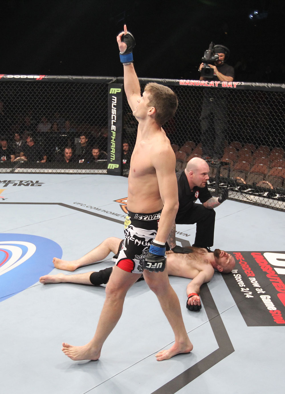 LAS VEGAS, NV - FEBRUARY 04:  Stephen Thompson (center) reacts to his knockout victory over Dan Stittgen during the UFC 143 event at Mandalay Bay Events Center on February 4, 2012 in Las Vegas, Nevada.  (Photo by Nick Laham/Zuffa LLC/Zuffa LLC via Getty Images) *** Local Caption *** Stephen Thompson