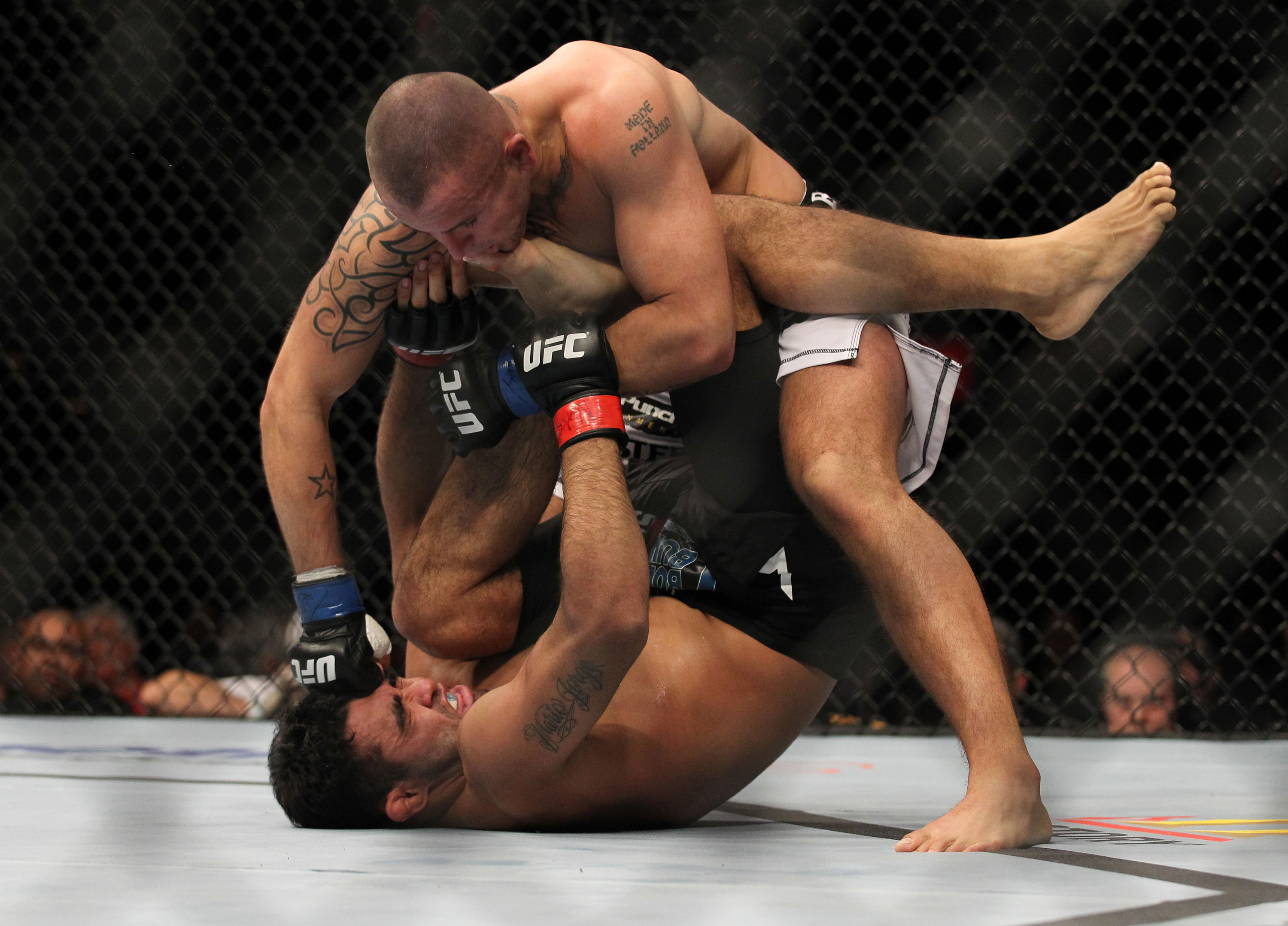 LAS VEGAS, NV - FEBRUARY 04:  Michael Kuiper (top) punches Rafael Natal during the UFC 143 event at Mandalay Bay Events Center on February 4, 2012 in Las Vegas, Nevada.  (Photo by Josh Hedges/Zuffa LLC/Zuffa LLC via Getty Images) *** Local Caption *** Michael Kuiper; Rafael Natal