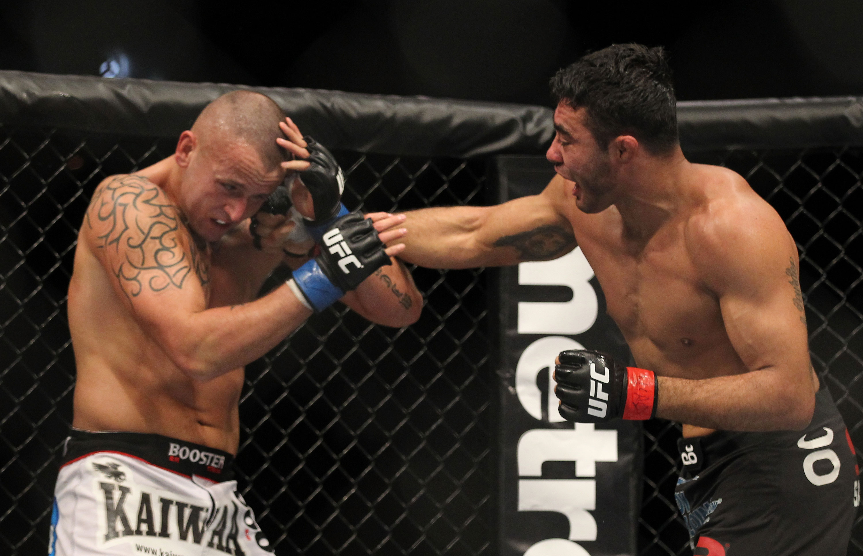 LAS VEGAS, NV - FEBRUARY 04:  Rafael Natal (right) punches Michael Kuiper during the UFC 143 event at Mandalay Bay Events Center on February 4, 2012 in Las Vegas, Nevada.  (Photo by Josh Hedges/Zuffa LLC/Zuffa LLC via Getty Images) *** Local Caption *** Rafael Natal; Michael Kuiper