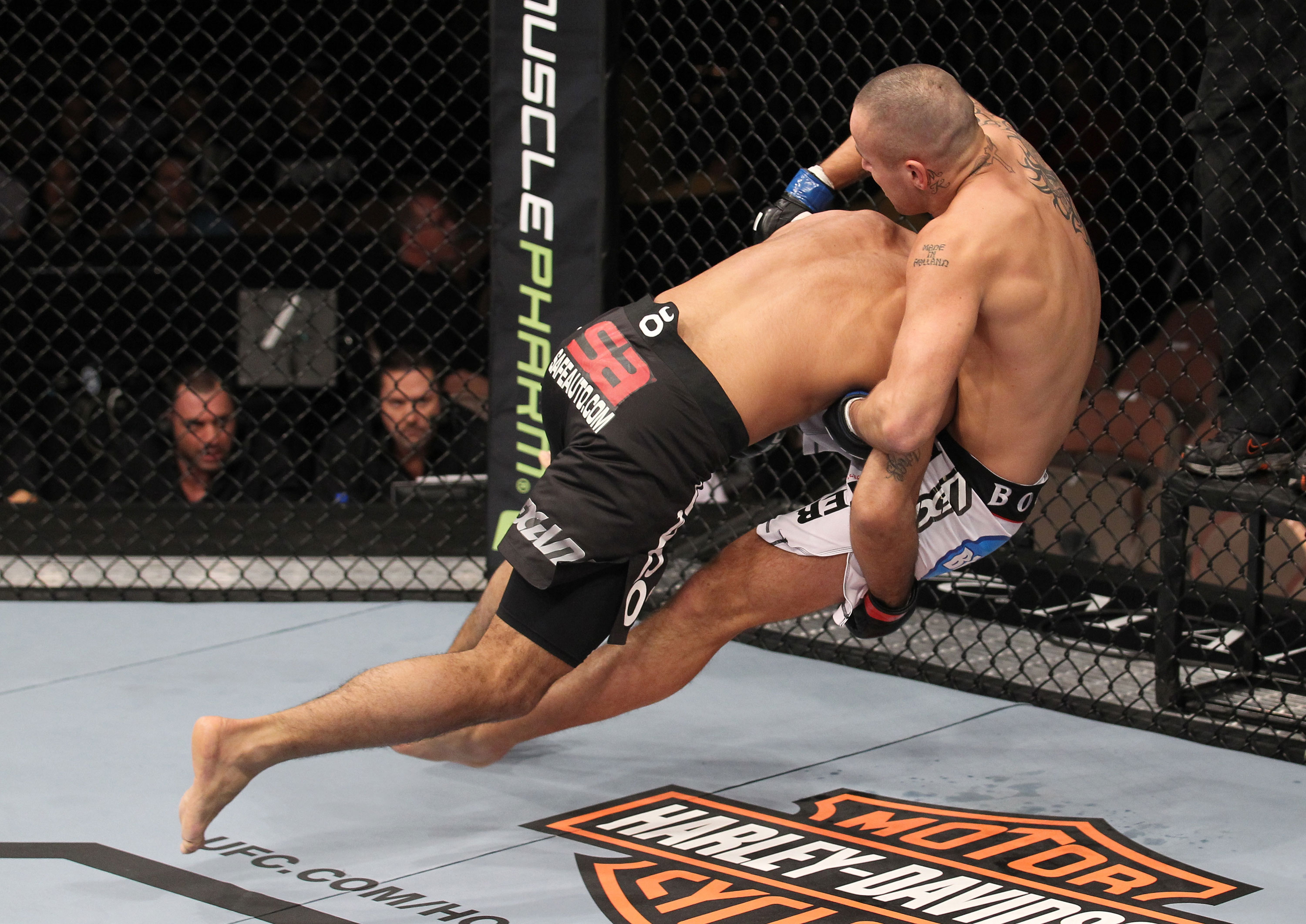 LAS VEGAS, NV - FEBRUARY 04:  Rafael Natal (black shorts) takes Michael Kuiper down to the canvas during the UFC 143 event at Mandalay Bay Events Center on February 4, 2012 in Las Vegas, Nevada.  (Photo by Nick Laham/Zuffa LLC/Zuffa LLC via Getty Images) *** Local Caption *** Rafael Natal; Michael Kuiper