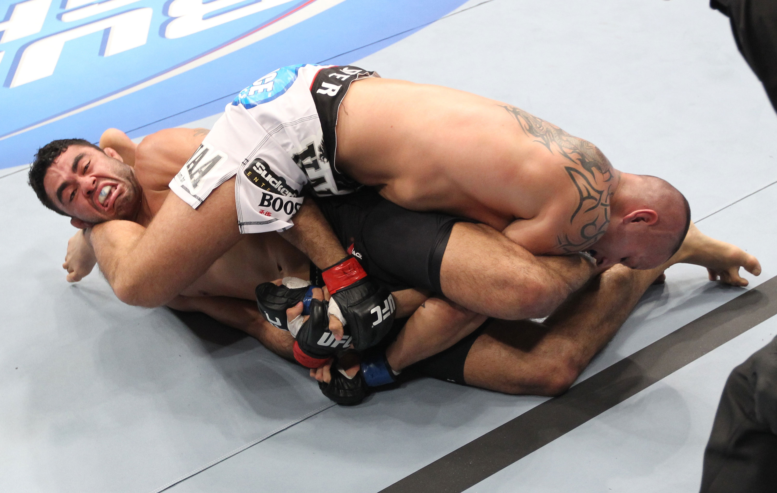 LAS VEGAS, NV - FEBRUARY 04:  Rafael Natal (left) attempts to submit Michael Kuiper during the UFC 143 event at Mandalay Bay Events Center on February 4, 2012 in Las Vegas, Nevada.  (Photo by Nick Laham/Zuffa LLC/Zuffa LLC via Getty Images) *** Local Caption *** Rafael Natal; Michael Kuiper