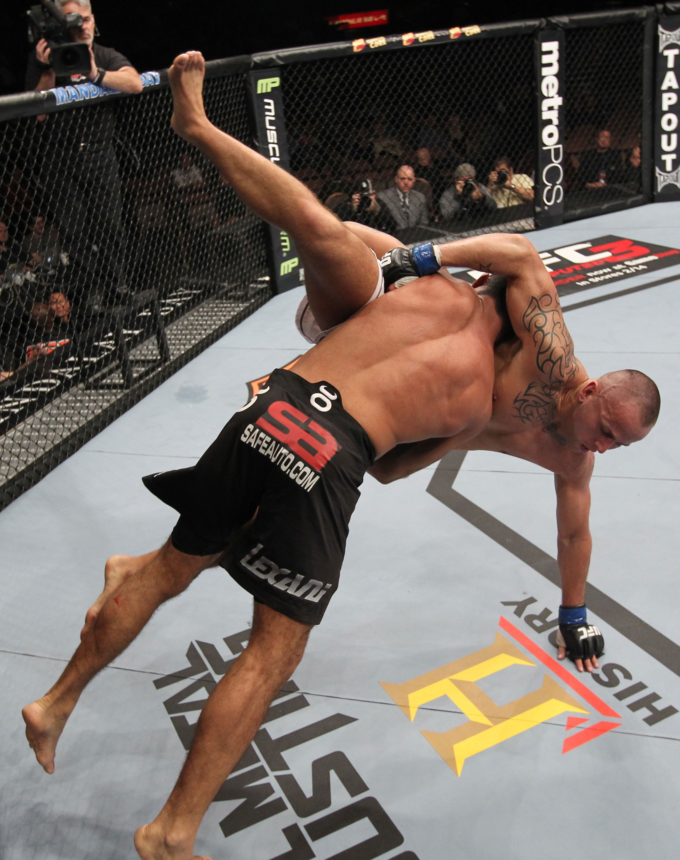 LAS VEGAS, NV - FEBRUARY 04:  Rafael Natal (black shorts) slams Michael Kuiper down to the canvas during the UFC 143 event at Mandalay Bay Events Center on February 4, 2012 in Las Vegas, Nevada.  (Photo by Nick Laham/Zuffa LLC/Zuffa LLC via Getty Images) *** Local Caption *** Rafael Natal; Michael Kuiper