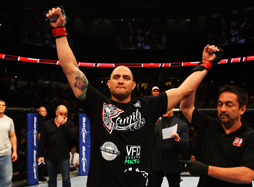 ATLANTA, GA - APRIL 21: Travis Browne celebrates defeating Chad Griggs by tap out from an arm triangle during their heavyweight bout for UFC 145 at Philips Arena on April 21, 2012 in Atlanta, Georgia. (Photo by Al Bello/Zuffa LLC/Zuffa LLC via Getty Images)