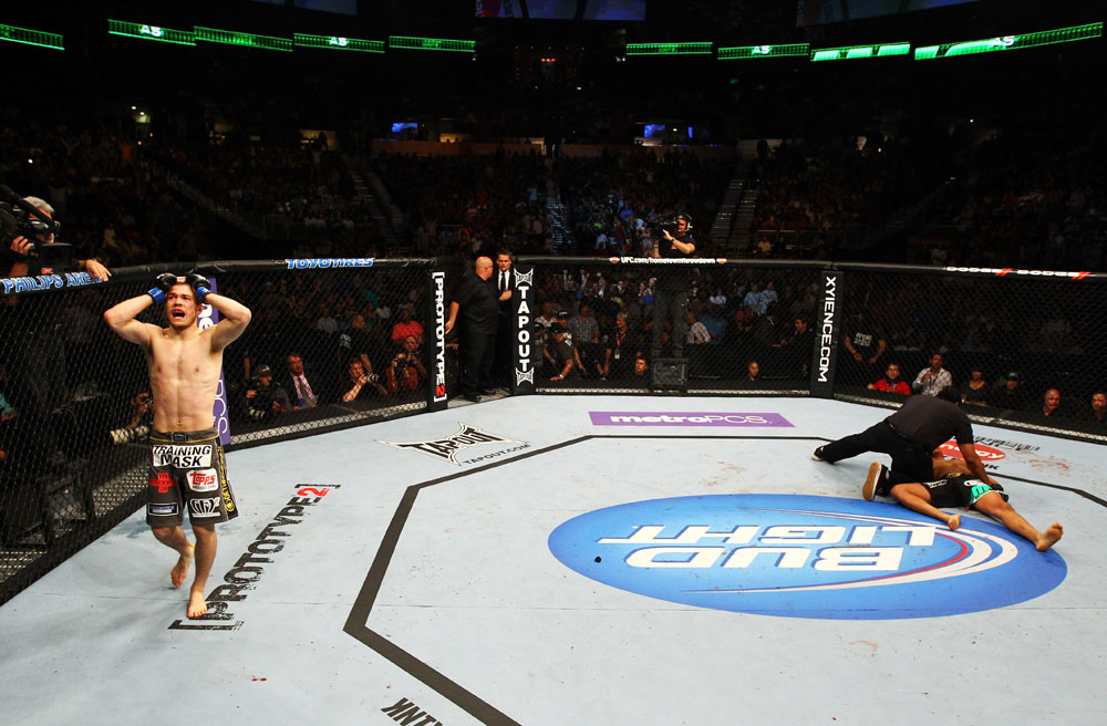 ATLANTA, GA - APRIL 21: Michael McDonald celebrates defeating Miguel Angel Torres by knockout in the first round during their Bantamweight bout for UFC 145 at Philips Arena on April 21, 2012 in Atlanta, Georgia. (Photo by Al Bello/Zuffa LLC/Zuffa LLC via Getty Images)