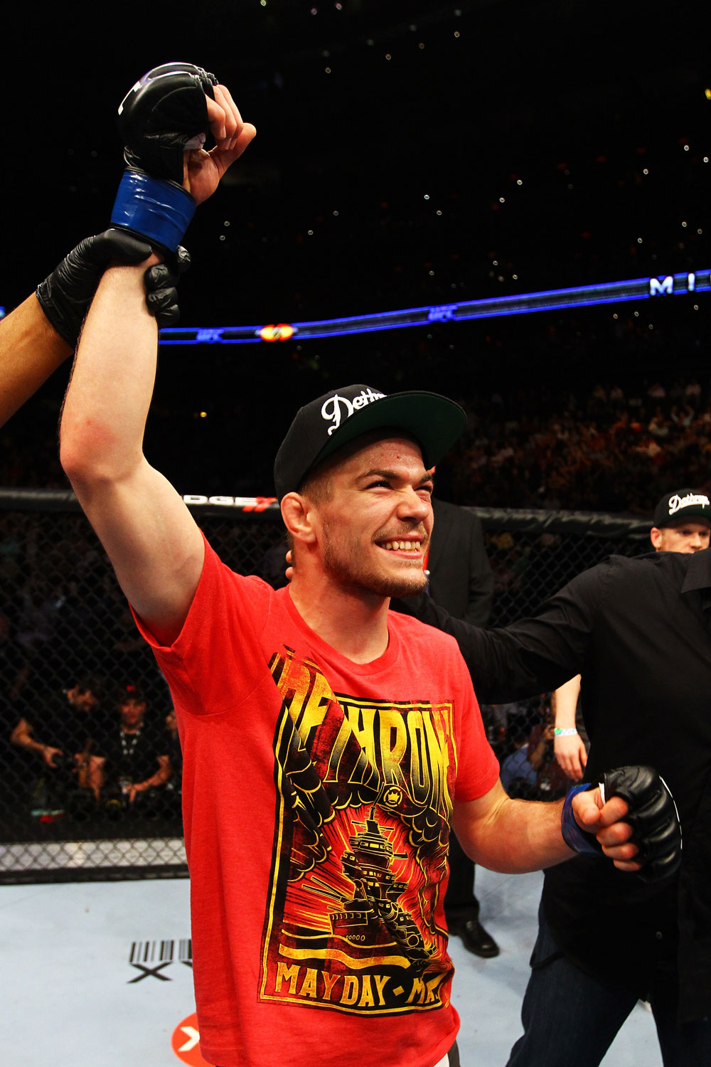 ATLANTA, GA - APRIL 21:  Michael McDonald celebrates defeating Miguel Angel Torres by knockout in the first round during their Bantamweight bout for UFC 145 at Philips Arena on April 21, 2012 in Atlanta, Georgia.  (Photo by Al Bello/Zuffa LLC/Zuffa LLC via Getty Images)
