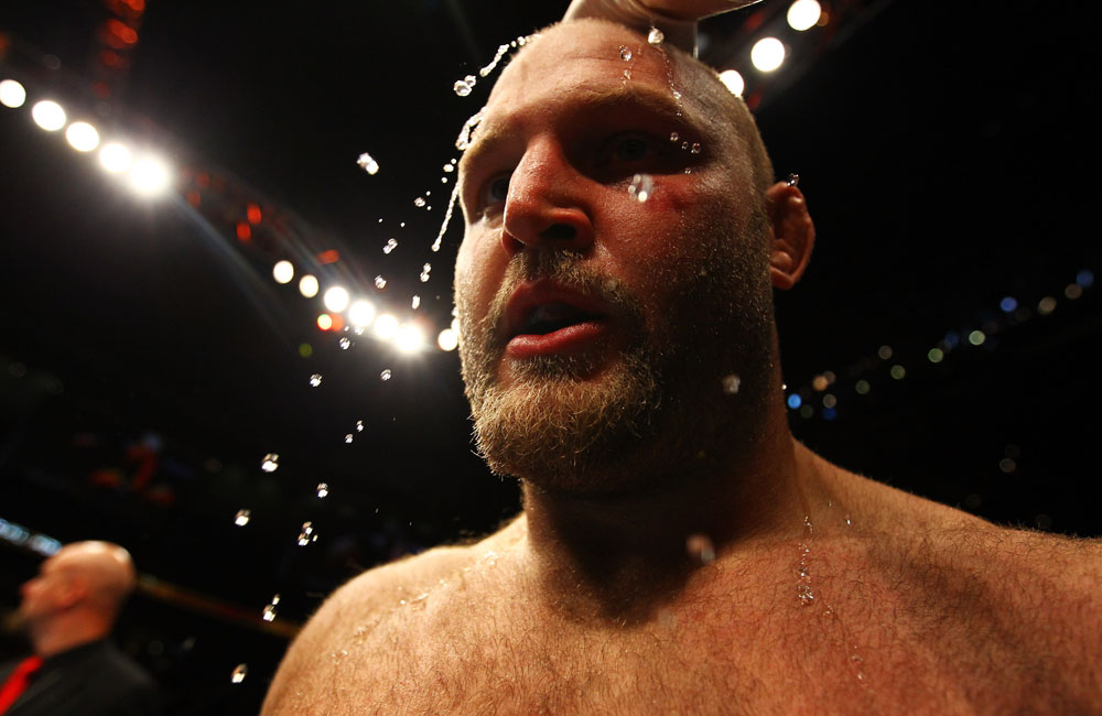 ATLANTA, GA - APRIL 21:  Water is applied to Ben Rothwell's head after he defeated Brendan Schaub by TKO in the first round of their heavyweight bout for UFC 145 at Philips Arena on April 21, 2012 in Atlanta, Georgia.  (Photo by Al Bello/Zuffa LLC/Zuffa LLC via Getty Images)