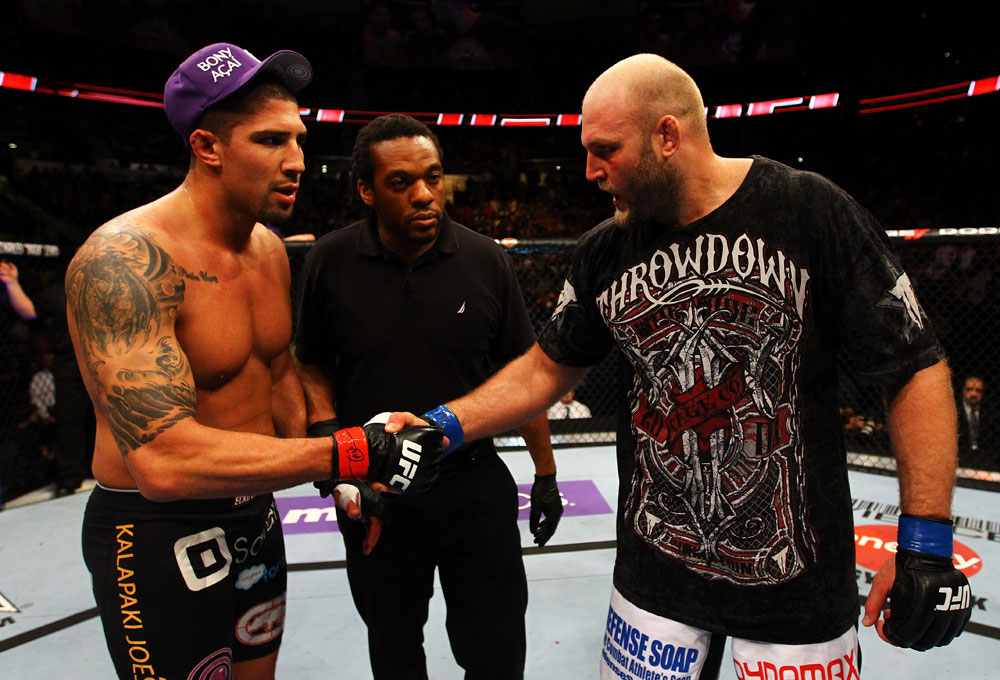 ATLANTA, GA - APRIL 21:  Brendan Schaub (L) shakes hands with Ben Rothwell after Rothwell defeated him by TKO in their heavyweight bout for UFC 145 at Philips Arena on April 21, 2012 in Atlanta, Georgia.  (Photo by Al Bello/Zuffa LLC/Zuffa LLC via Getty Images)