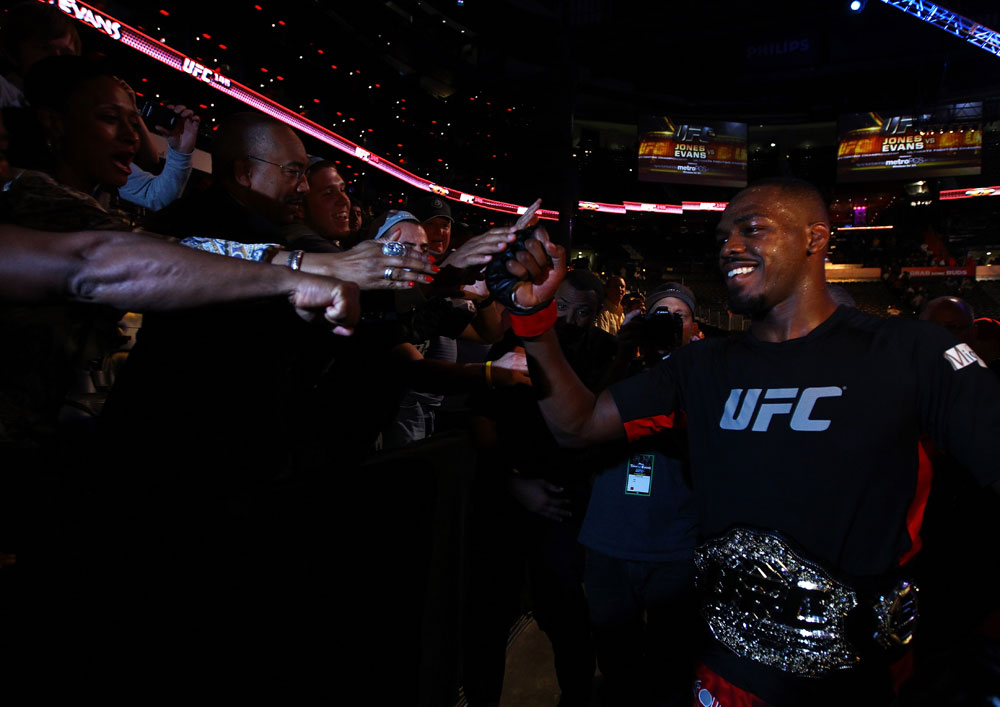 ATLANTA, GA - APRIL 21:  Jon Jones celebrates with fans after defeating Rashad Evans by unanimous decision in their light heavyweight title bout for UFC 145 at Philips Arena on April 21, 2012 in Atlanta, Georgia.  (Photo by Al Bello/Zuffa LLC/Zuffa LLC via Getty Images)