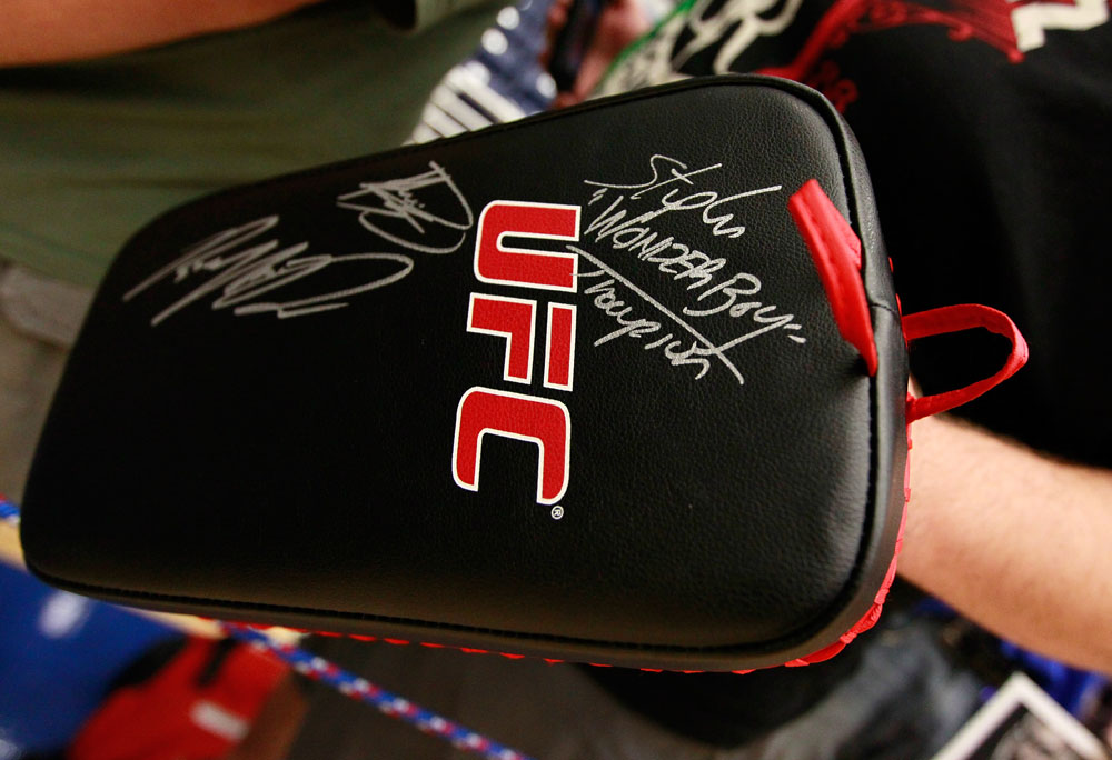 ATLANTA, GA - APRIL 19:  A fan holds up a pad to get autographs during UFC 145 open workouts at GSU Sports Arena on April 19, 2012 in Atlanta, Georgia.  (Photo by Kevin C. Cox/Zuffa LLC/Zuffa LLC via Getty Images)