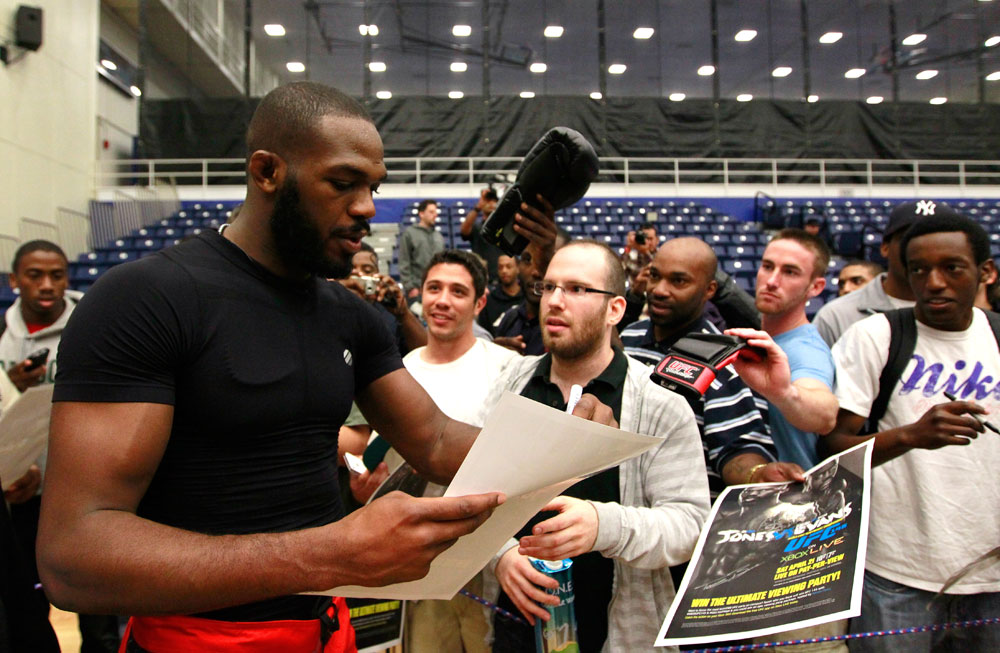ATLANTA, GA - APRIL 19: Jon Jones signs autographs for fans after working out for the media during UFC 145 open workouts at GSU Sports Arena on April 19, 2012 in Atlanta, Georgia. (Photo by Kevin C. Cox/Zuffa LLC/Zuffa LLC via Getty Images)