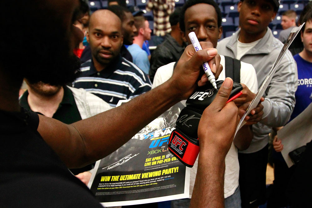 ATLANTA, GA - APRIL 19: Jon Jones signs autographs for fans after working out for the media during UFC 145 open workouts at GSU Sports Arena on April 19, 2012 in Atlanta, Georgia. (Photo by Kevin C. Cox/Zuffa LLC/Zuffa LLC via Getty Images)