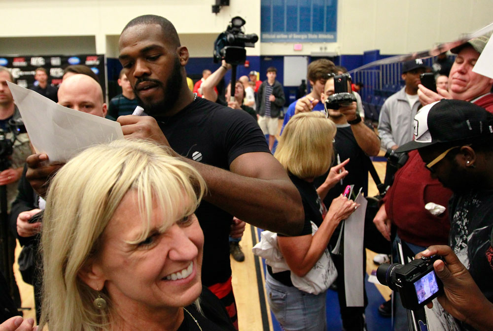 ATLANTA, GA - APRIL 19: Jon Jones signs autographs for fans after working out for the media during UFC 145 open workouts at GSU Sports Arena on April 19, 2012 in Atlanta, Georgia. (Photo by Kevin C. Cox/Zuffa LLC/Zuffa LLC via Getty Images)