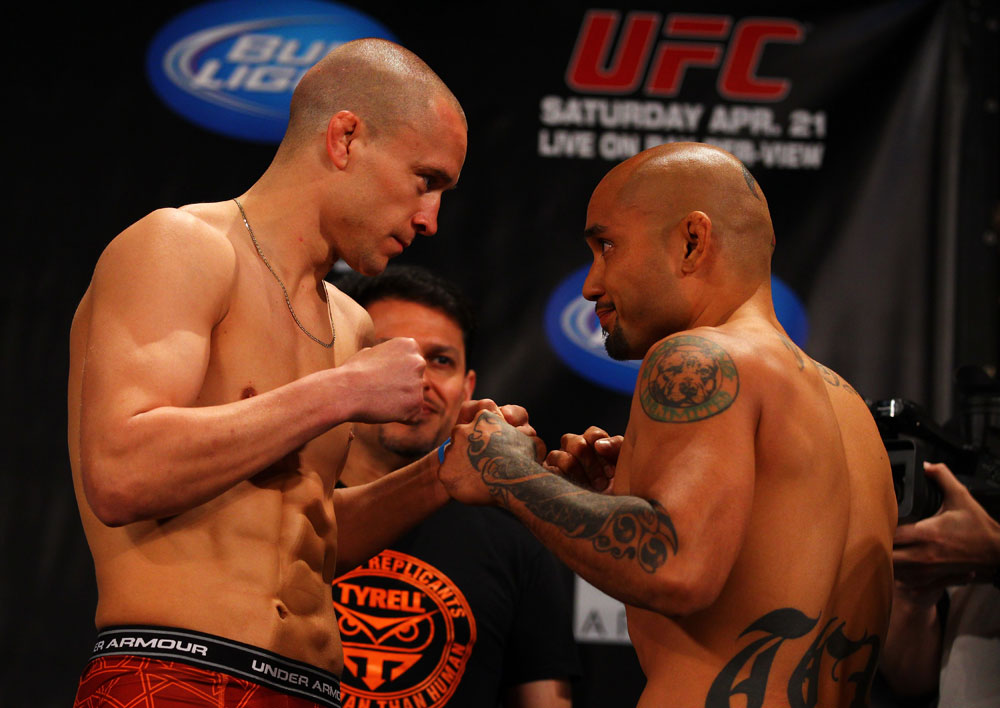 ATLANTA, GA - APRIL 20:  Featherweight fighters Mark Hominick (L) and Eddie Yagin square off during the UFC 145 official weigh in at Fox Theatre on April 20, 2012 in Atlanta, Georgia.  (Photo by Al Bello/Zuffa LLC/Zuffa LLC via Getty Images)