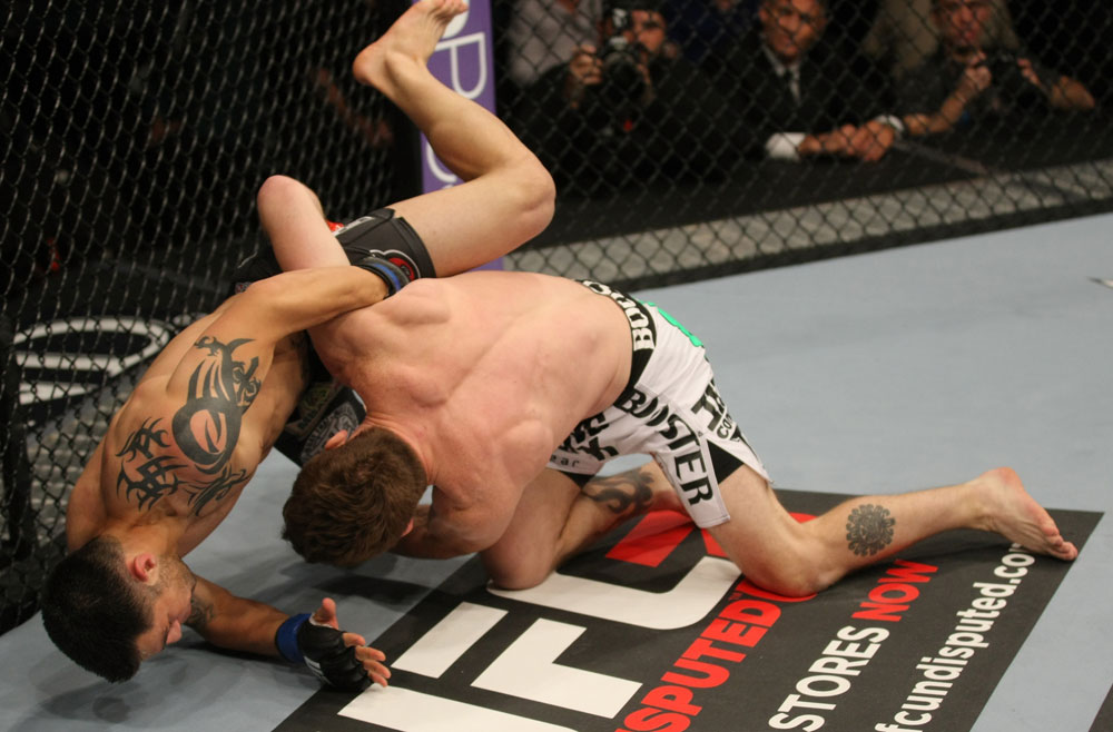 LAS VEGAS, NV - MAY 26:  (R-L) Mike Brown slams Daniel Pineda during a light featherweight bout at UFC 146 at MGM Grand Garden Arena on May 26, 2012 in Las Vegas, Nevada.  (Photo by Donald Miralle/Zuffa LLC/Zuffa LLC via Getty Images)