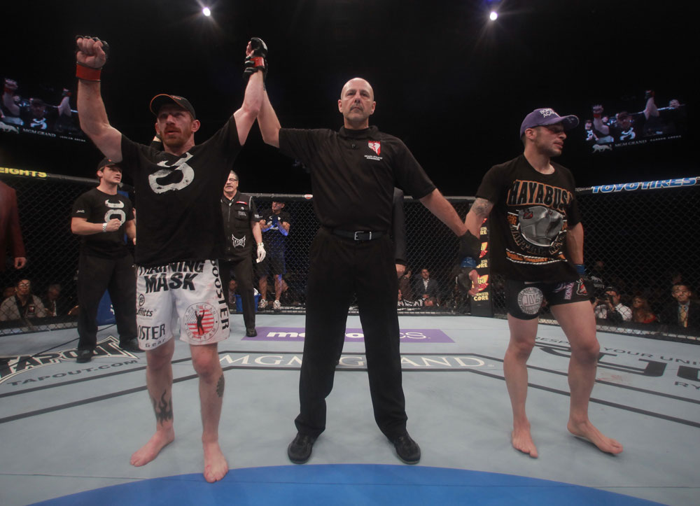 LAS VEGAS, NV - MAY 26:  Mike Brown (L) is declared the winner over Daniel Pineda (R) during a featherweight bout at UFC 146 at MGM Grand Garden Arena on May 26, 2012 in Las Vegas, Nevada.  (Photo by Donald Miralle/Zuffa LLC/Zuffa LLC via Getty Images)