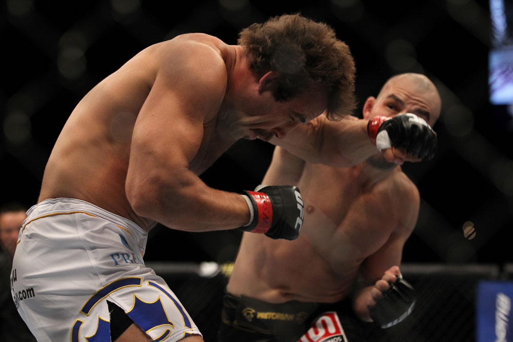LAS VEGAS, NV - MAY 26:  Glover Teixeira (right) punches Kyle Kingsbury during a light heavyweight bout at UFC 146 at MGM Grand Garden Arena on May 26, 2012 in Las Vegas, Nevada.  (Photo by Josh Hedges/Zuffa LLC/Zuffa LLC via Getty Images)