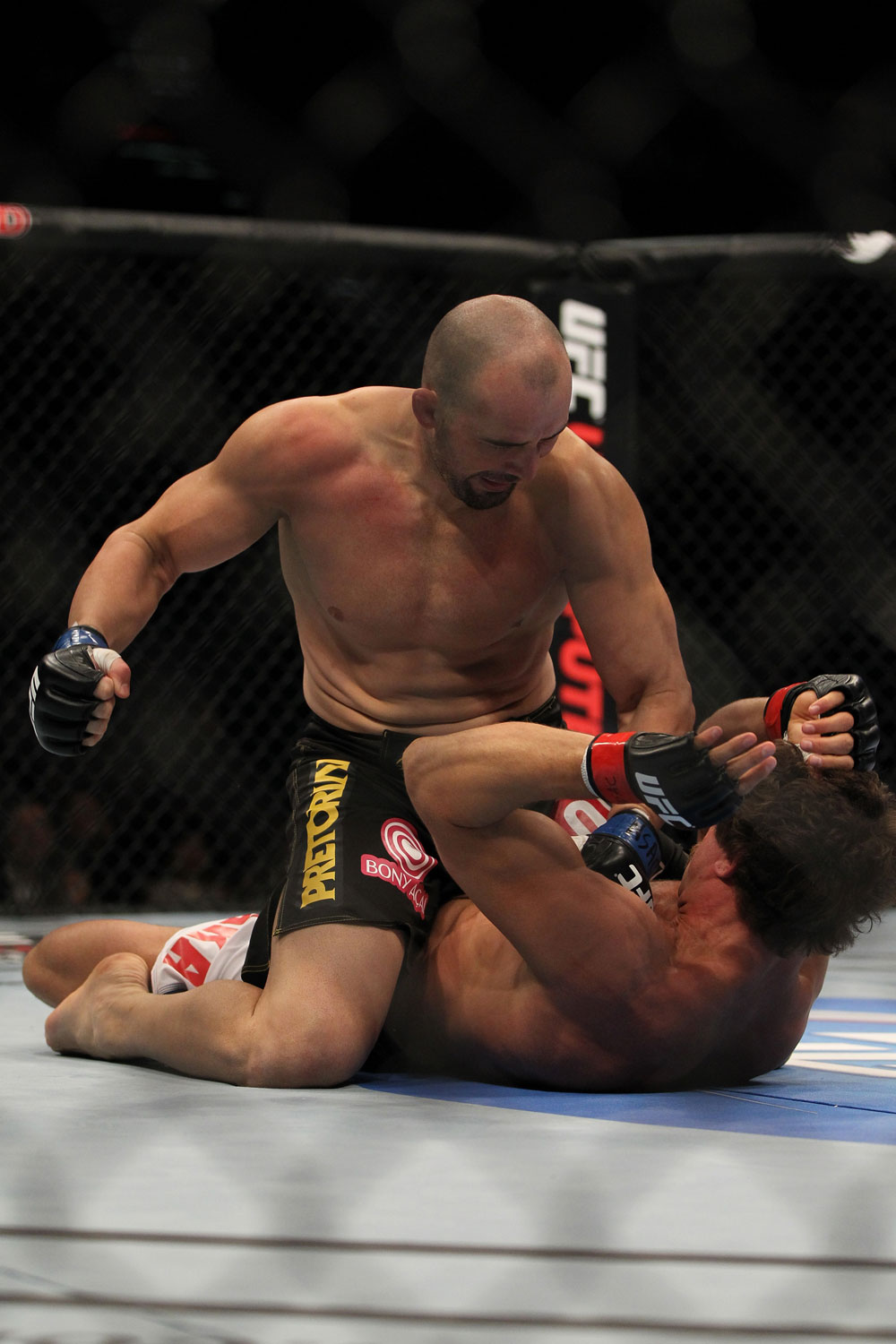 LAS VEGAS, NV - MAY 26:  Glover Teixeira (top) punches Kyle Kingsbury during a light heavyweight bout at UFC 146 at MGM Grand Garden Arena on May 26, 2012 in Las Vegas, Nevada.  (Photo by Josh Hedges/Zuffa LLC/Zuffa LLC via Getty Images)