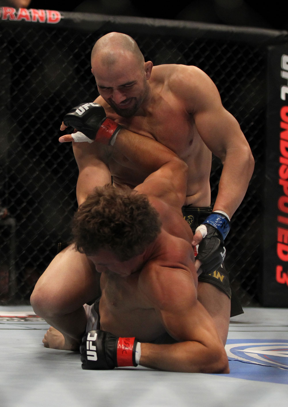 LAS VEGAS, NV - MAY 26:  Glover Teixeira (top) punches Kyle Kingsbury during a light heavyweight bout at UFC 146 at MGM Grand Garden Arena on May 26, 2012 in Las Vegas, Nevada.  (Photo by Josh Hedges/Zuffa LLC/Zuffa LLC via Getty Images)