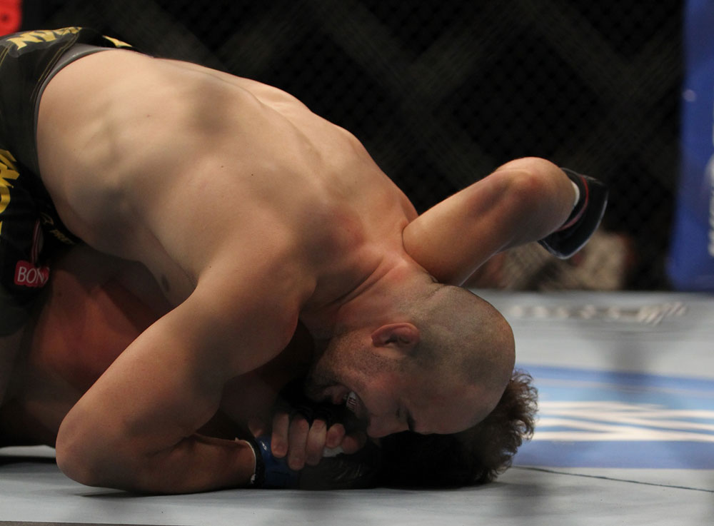 LAS VEGAS, NV - MAY 26:  Glover Teixeira attempts to submit Kyle Kingsbury during a light heavyweight bout at UFC 146 at MGM Grand Garden Arena on May 26, 2012 in Las Vegas, Nevada.  (Photo by Josh Hedges/Zuffa LLC/Zuffa LLC via Getty Images)
