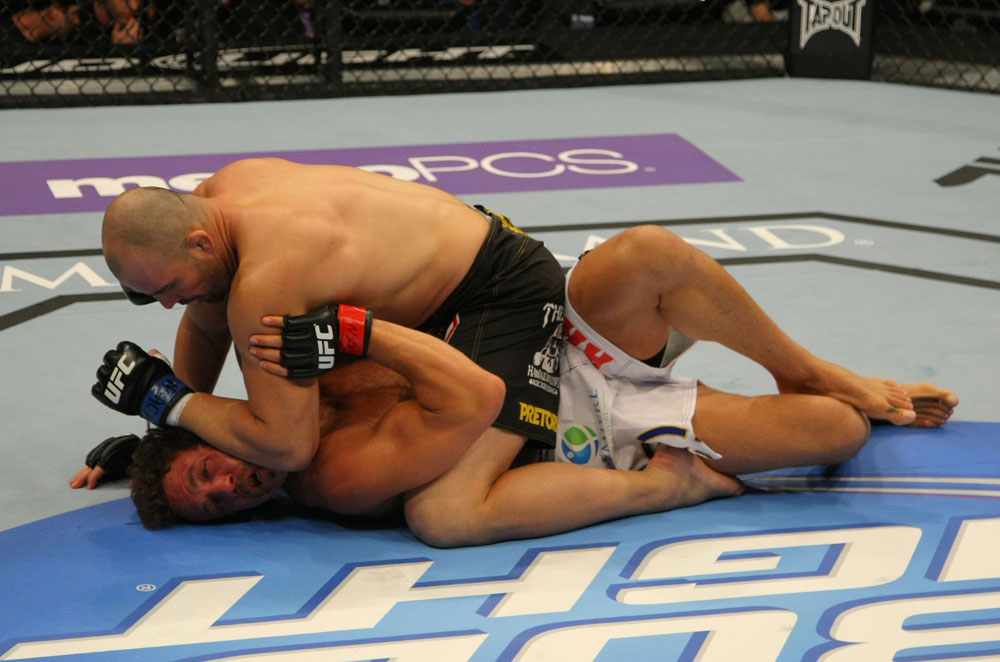 LAS VEGAS, NV - MAY 26:  Glover Teixeira (top) punches Kyle Kingsbury during a light heavyweight bout at UFC 146 at MGM Grand Garden Arena on May 26, 2012 in Las Vegas, Nevada.  (Photo by Donald Miralle/Zuffa LLC/Zuffa LLC via Getty Images)